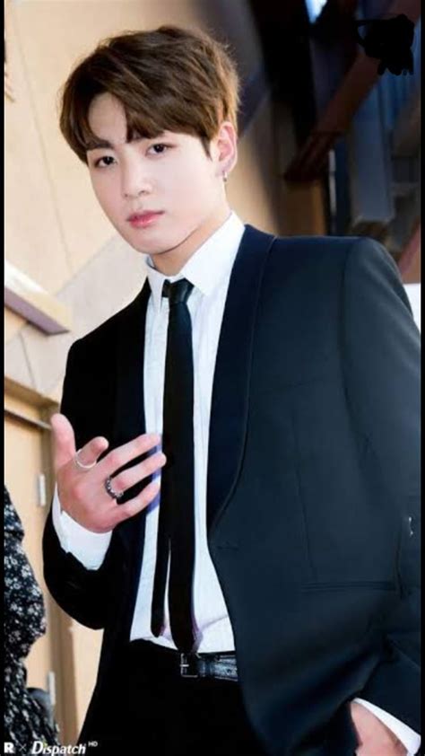 jungkook in black suit.